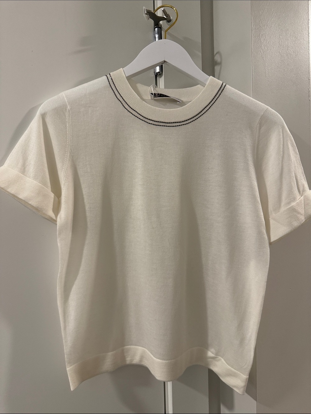 Woman’s Cream Short-Sleeve Knit Shirt with Contrast Neck Trim